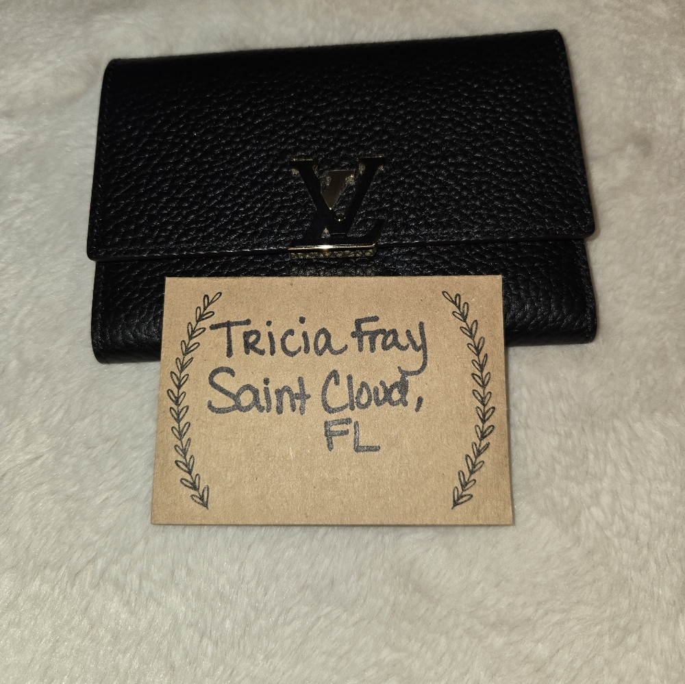 Louis Vuitton Black and Gold with Pink Interior Capucine Noir wallet